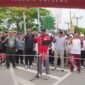 Bupati Barito Utara, H. Shalahuddin, memberikan sambutan saat launching Muara Teweh Car Free Day di Bundaran Buah, Minggu (21/6/2026).