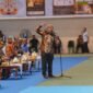 Bupati Barito Utara, H. Shalahuddin, menyampaikan komitmen daerah dalam mendukung program prioritas Gubernur pada Rakor Pemerintahan Desa/Kelurahan se-Kalteng di GOR Indoor Palangka Raya, Kamis (6/8/2026). (Foto: infomuarateweh/Ho Diskominfosandi Barito Utara)