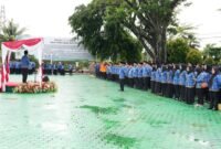 Bupati Barito Utara, H. Shalahuddin, membacakan sambutan Kepala ANRI pada apel gabungan Hari Kearsipan Nasional ke-55, Senin (18/5/2026).